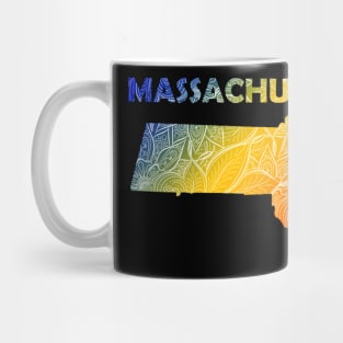 Colorful mandala art map of Massachusetts with text in blue, yellow, and red Mug